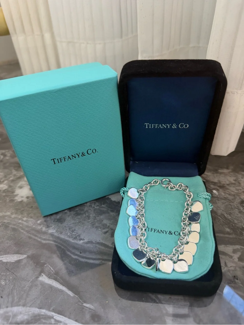 Tiffany & Co. Sterling Silver Multi-Heart Charm Bracelet with Signature Blue
